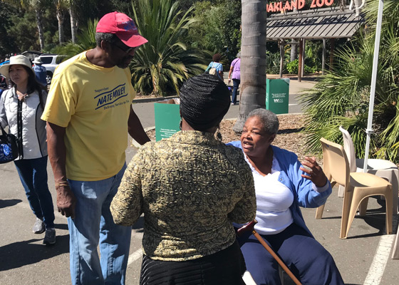 Supervisor Miley speaking with seniors of Alameda County